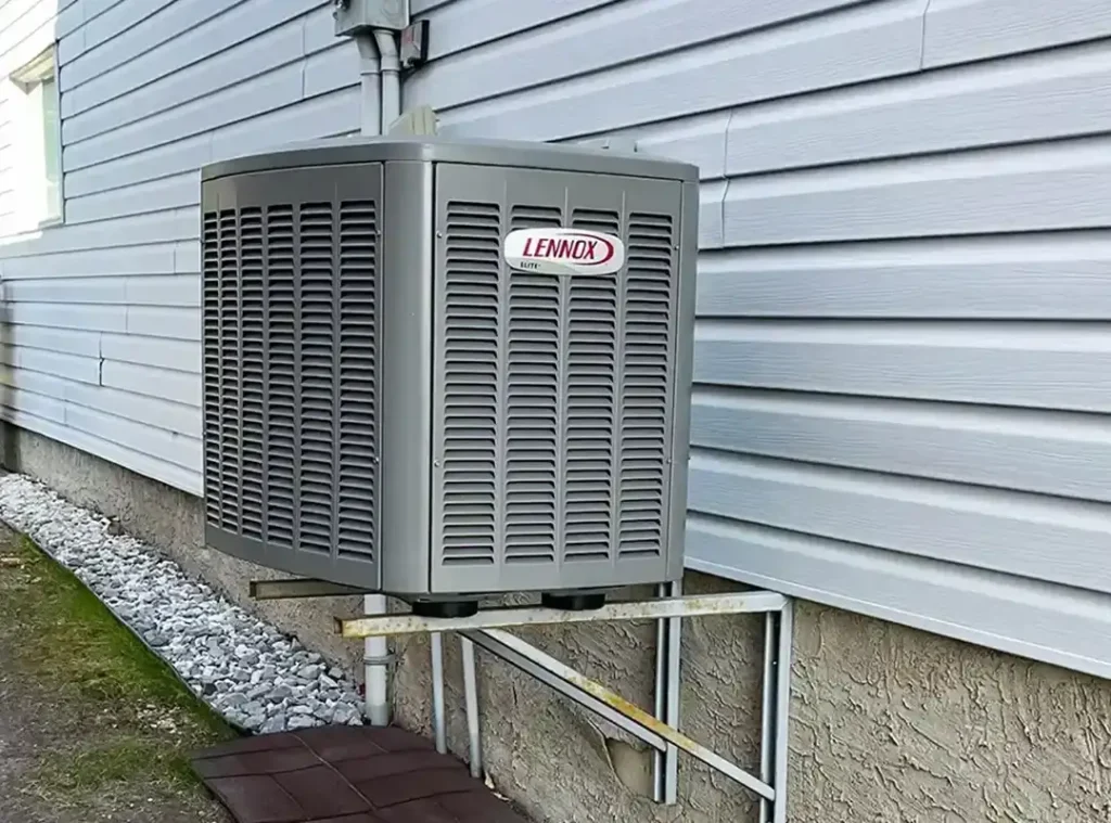 Efficient Lennox air conditioner mounted outside a house by Comfort Union technicians