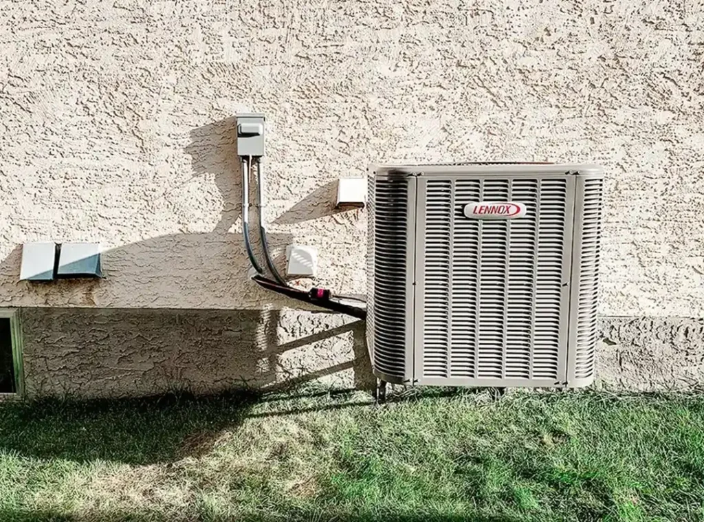 Lennox air conditioning unit installed by comfort union outside a residential home