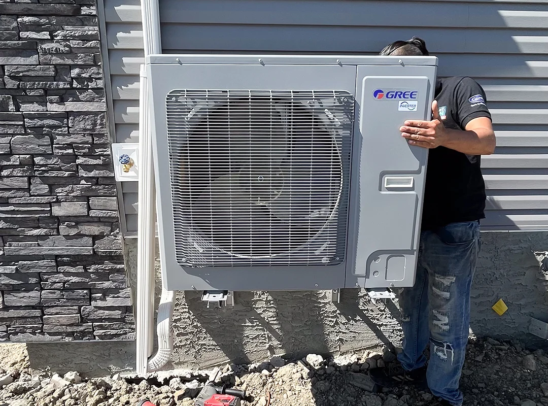 Heat Pump Installation with team member