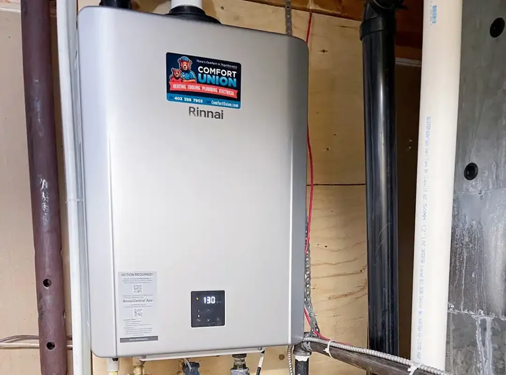 Rinnai tankless unit mounted with exposed installation details by Comfort Union