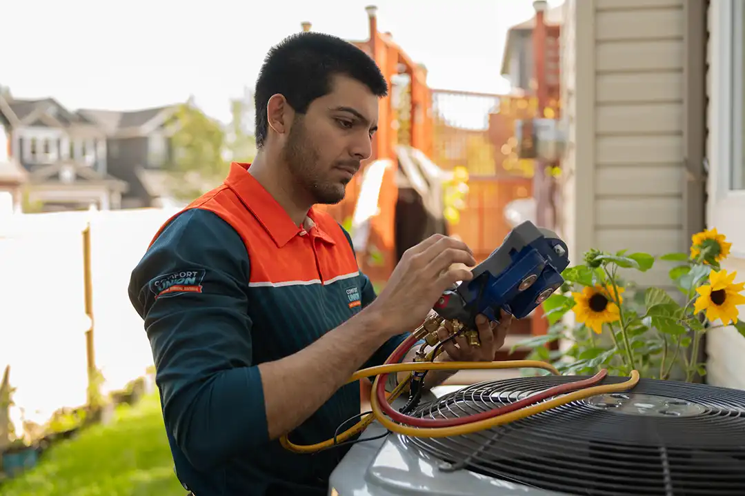 Expert technician performing HVAC performance analysis