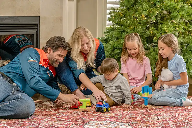 Kid enjoying cozy home environment thanks to Comfort Union HVAC