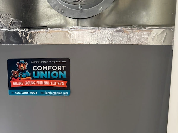 Heat pump installed by the Comfort Union team, proudly shown by the client after installation.