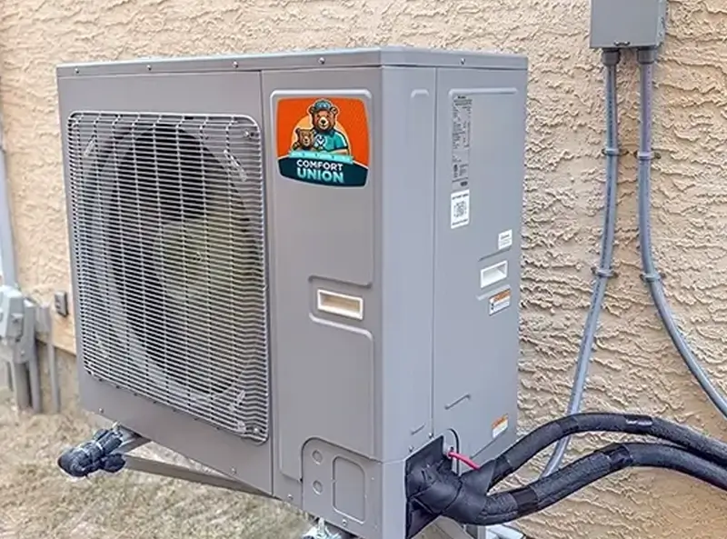 Cold-climate heat pump installation by The Comfort Union, designed for reliable winter heating in Calgary temperatures down to -30°C.
