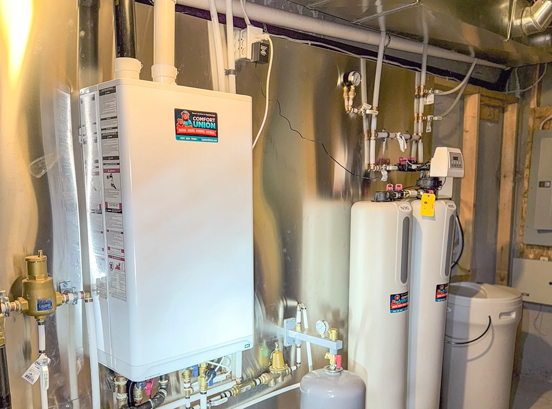 Wall-mounted IBC boiler installed by Comfort Union technician in Calgary