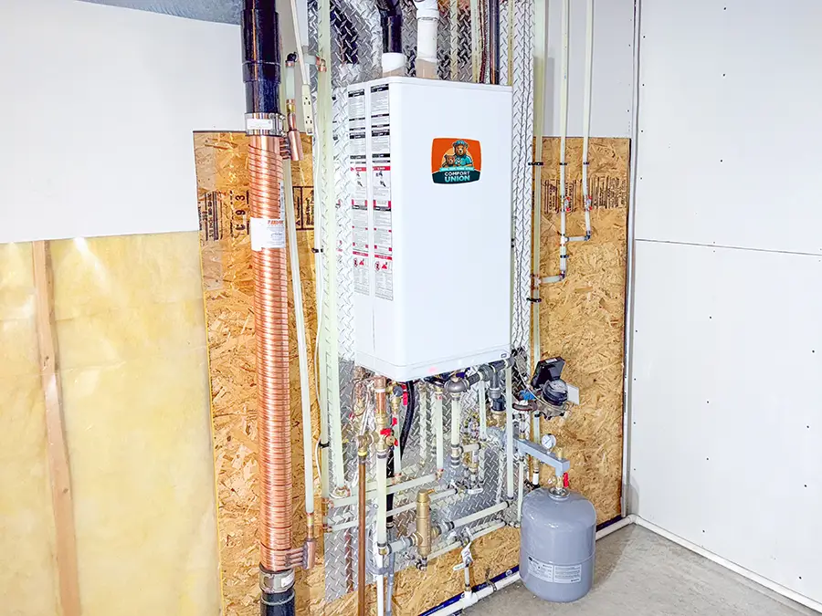 Energy-efficient combi boiler setup in Calgary home by Comfort Union