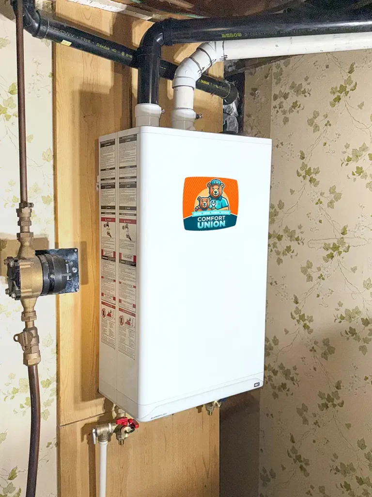 Comfort Union HVAC technicians installing combi boiler in Calgary property