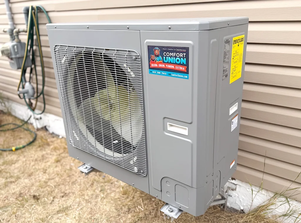 Heat pump unit in a Calgary winter setting