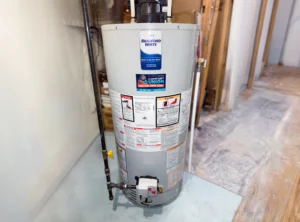 aging hot water tank showing rust and sediment buildup