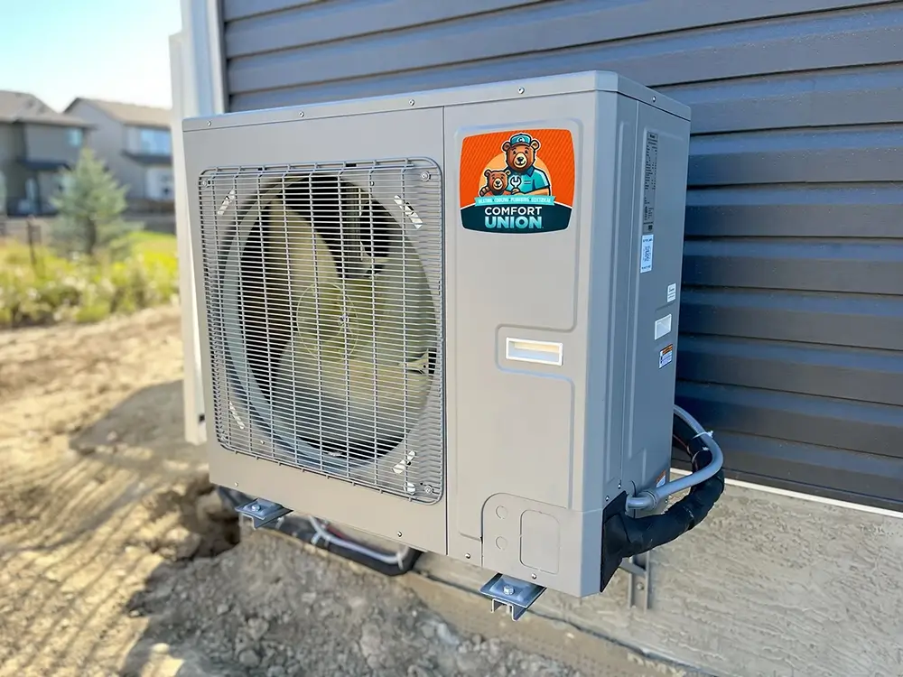 New efficient heat pump installed in Calgary backyard area