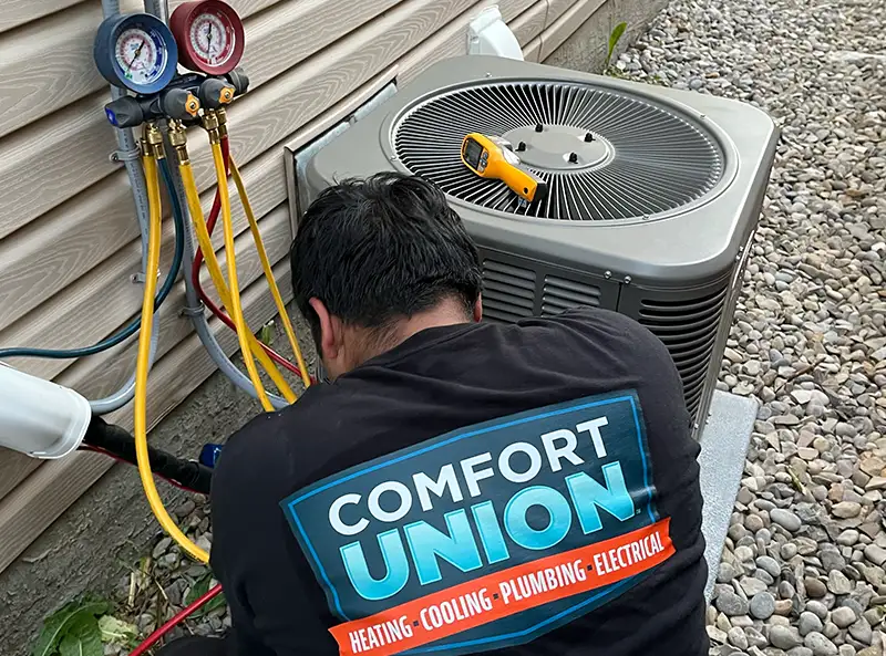 Comfort Union Technician Installing AC