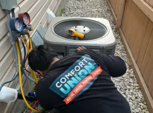 Comfort Union Technician Installing AC