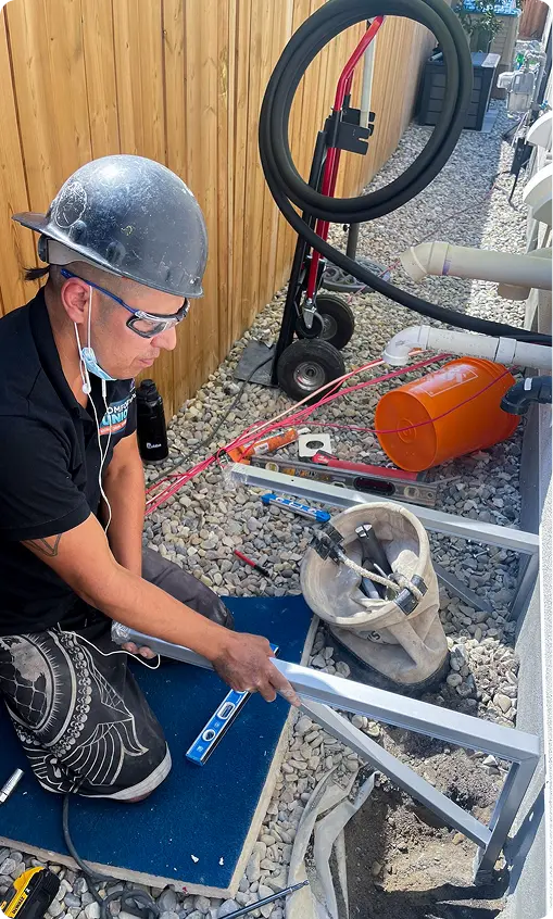 Comfort Union technician installing HVAC system equipment at residential property