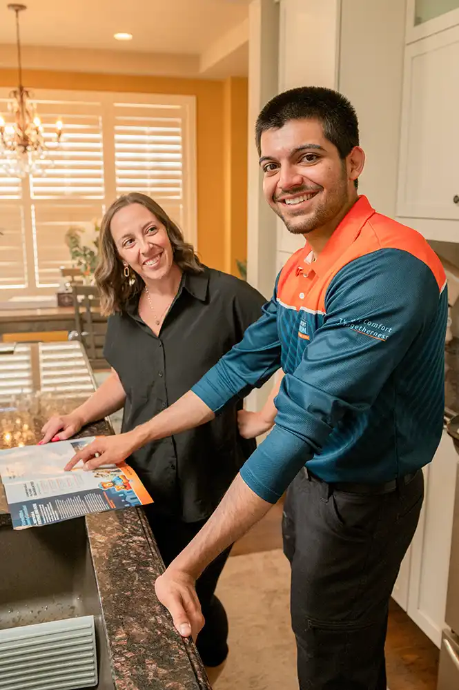 Comfort Union HVAC technician explaining furnace repair Calgary