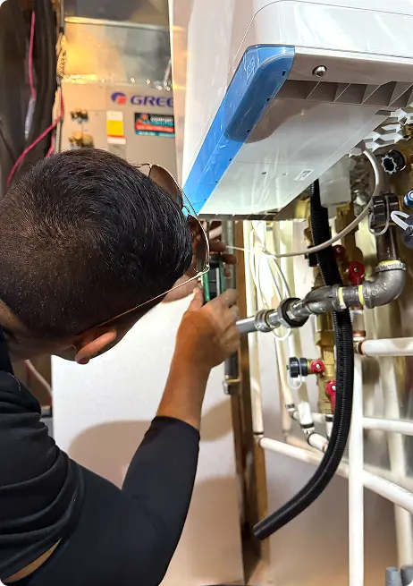 Tankless Installation by comfort union technician in Calgary